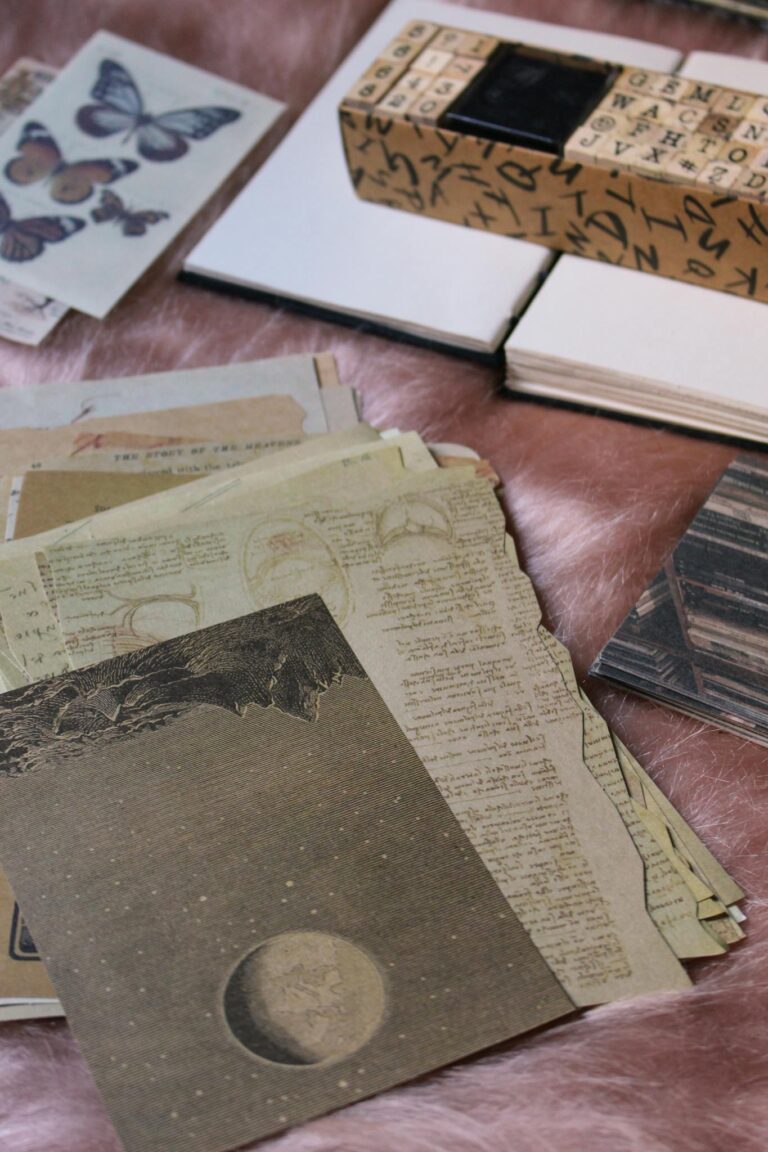 A collection of vintage scrapbooking materials with a retro aesthetic, featuring papers and stamps on a soft background.